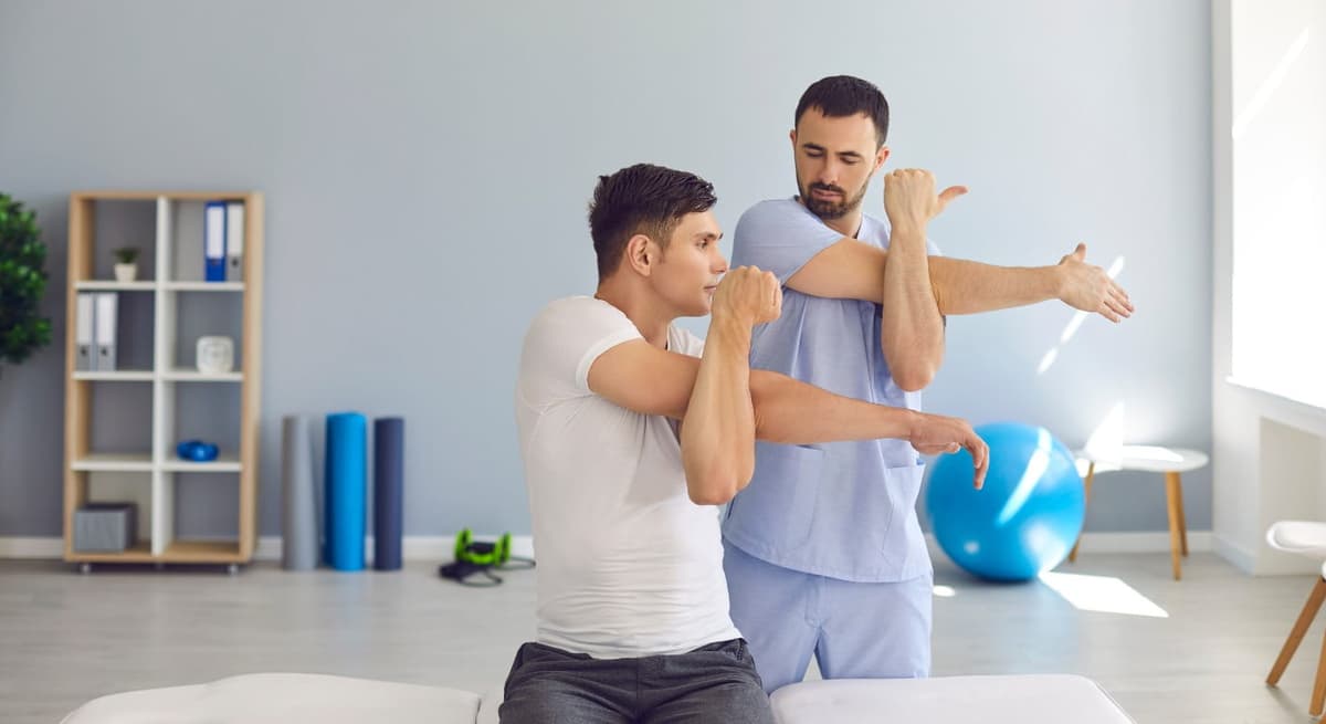 Manual therapy session for shoulder sports injury rehabilitation Dubai