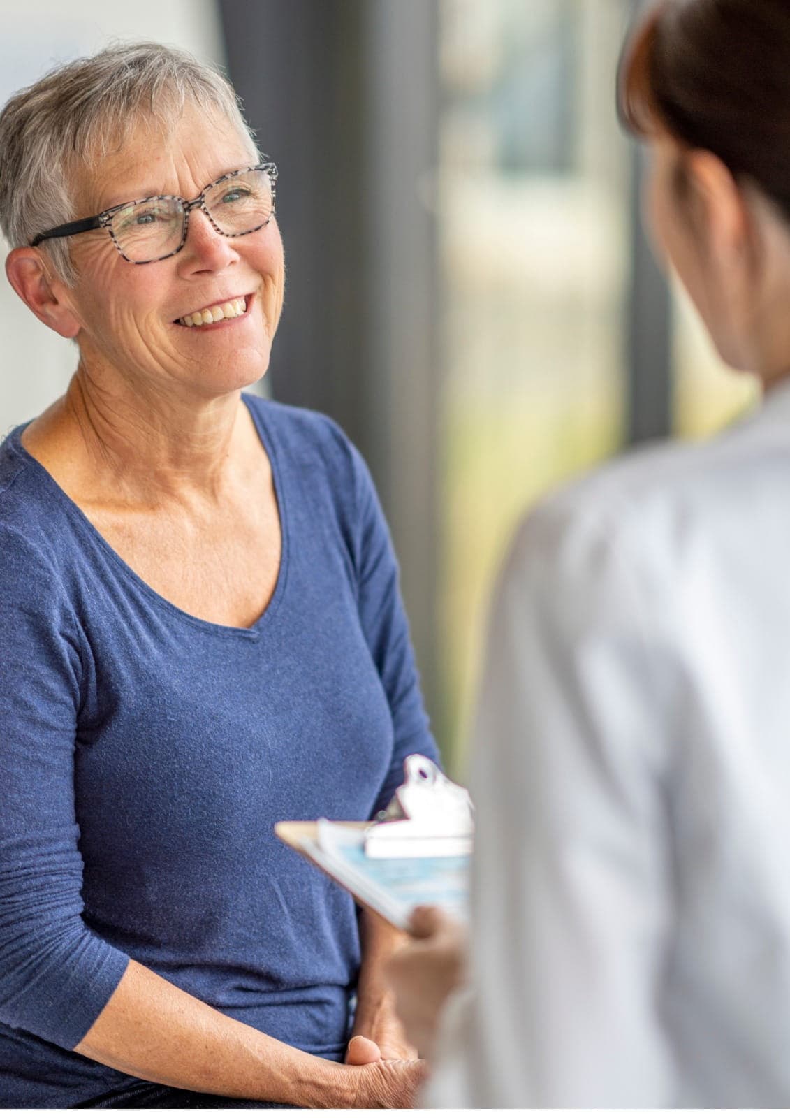 General physician performing a routine health check-up in a clean and organized clinic, preventive care focus, no text