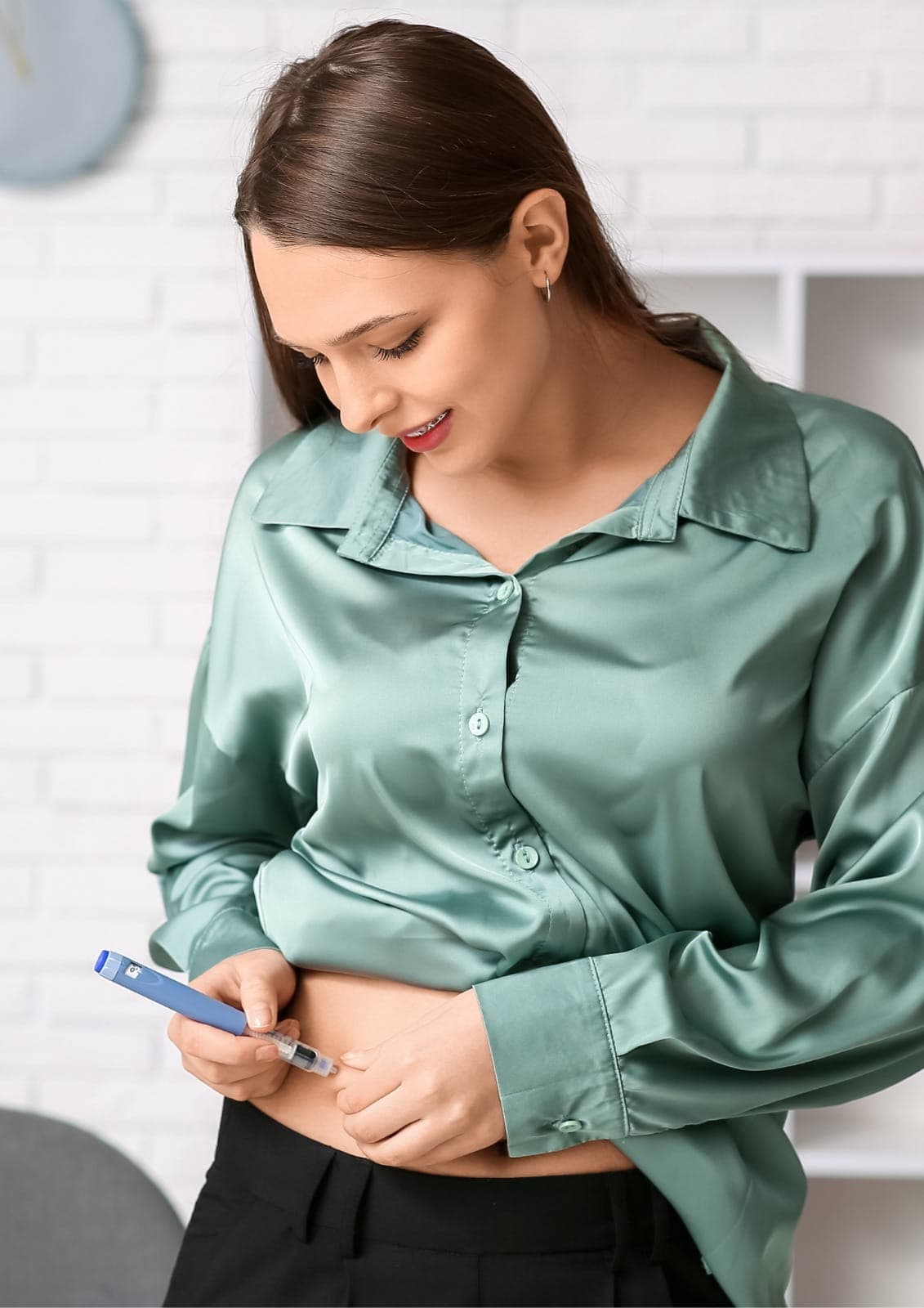 Doctor monitoring blood sugar levels and advising a patient on diabetes care, professional clinic environment, no text